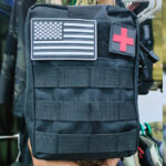 Emergency Survival Kit and First Aid Kit Professional Survival Gear SOS Emergency Tool with Molle Pouch (Black)